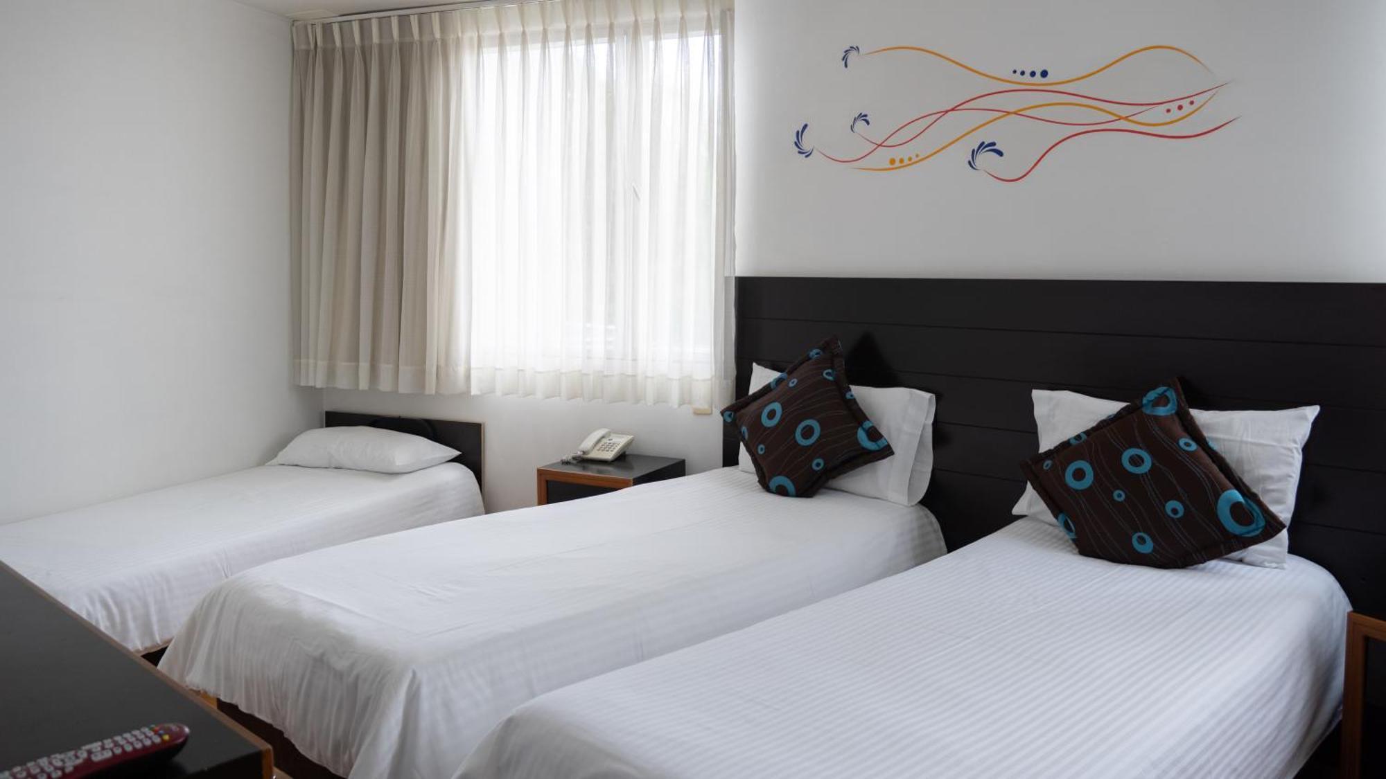 Benidorm Hotel Manizales Esterno foto